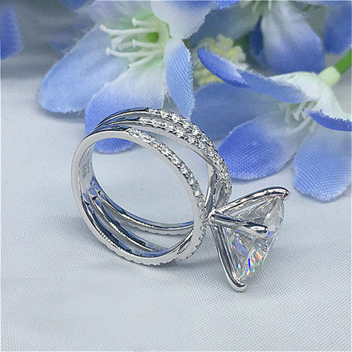 Glamorous Four Prong Round Stone Ring